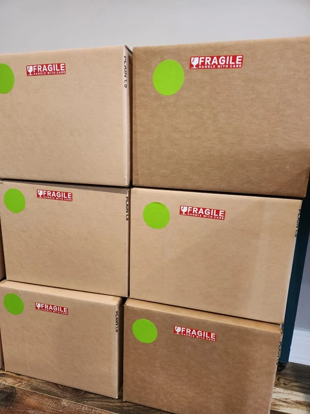 Carefully labeled moving boxes ready for transport